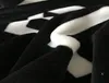 Manta polar de franela negra, 2 tamaños, 130x150cm, 150x200cm, sin bolsa para el polvo, logotipo de estilo C para viaje, hogar, oficina, manta para siesta