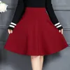 ربيع الخريف المرأة ميدي تنورة الكورية الأزياء ضئيلة جيب مرونة عالية الخصر ألف خط تنورة زائد الحجم أسود مثير تنورة 210303