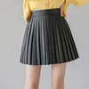 Vår sommar veckad minikjol kvinnors mode harajuku slim kvinnliga streetwear hög midja pu läder w220314