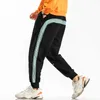 Pantaloni sportivi a righe laterali Pantaloni da jogger di marca da uomo Pantaloni da uomo streetwear moda hip-hop Pantaloni harem larghi maschili 210714