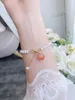 Цепочка звена человеческие персиковые браслеты самка южная красная рука струна пресноводная жемчужная жемчужина дизайн Sen Tie Bracelet