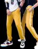 Męskie spodnie męskie / Kobiety Joggers Casual Casual Drawstring Wygodne fitness sportowe spodnie dresowe Streetwear Dress Spodnie