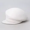 cappelli bianchi da giornale