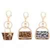 Nyckelringar Uppgraderade dekorativa varor Aluminiumlegering Craft Leopard Grain Modeling Key Rings Fashion Keychain for Girl Women Miri22