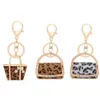 Keychains aprimorou bens decorativos de alumínio de alumínio artesanato de leopardo de modelagem de grãos chaveiros de moda para meninas miri22