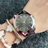 Orologio da polso al quarzo di marca per donna Ragazza cinturino in acciaio metallo cristallo colorato Orologi M100