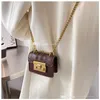 Parent-Child Handbag 2022 Retro Texture Mini Small Sacs Sacs Woman Garçons Chaîne Cross-Body Sac Lady Kids Kids Casual Single Sacs F1038