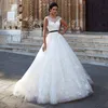 A-line Flor-uzunluk Jewel Balığa Gelinlik Dantel Aplike Bahçe Plaj Gelinlikler Siyah Sashes Backless Vestidos de Noiva