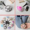 Kvinnor Creative Real Mink Fur Cat Paw Keychain Söt väska charmprydnader mjuka pompom plysch söt björn klo nyckelring bilnyckel hänge h7739225