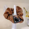 PU Anillo para el cabello Moda Lady Girl Womens Hair Bandas de goma Hairs Triangle Designer Sports Dance Scrunchie Hairband Pony Tails Holder