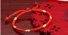 Braccialetti con portafortuna benedetti per coppie femminili con corda rossa, bracciale con perline dorate con uomini e donne