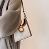 クリアランスバッグ女性新しいファッションワンショルダースモールスクエアスタイル汎用脇の下のメッセンジャーハンドバッグ