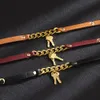 Nieuwe trendy handgemaakte zwart bruin lederen link armbanden 24cm lange legering ketting armband te koop