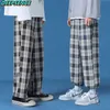 Hommes Polyester lâche japon Harajuku style grille large pantalon décontracté cordon élastique jambe ouverture cheville longueur 210715