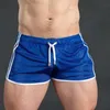 Pantaloncini da uomo Maglia da uomo Pantaloni corti da spiaggia ad asciugatura rapida Allenamento Esercizio da jogging Hole Sport sexy