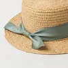 2021 Summer girls straw sunhat kids ribbon Bow princess hat children ceiling beach holiday outdoor sunhat visor A582895621
