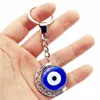 Turkish Evil Eye Keychain Charms 360 Degree Rotation Moon Pendant Metal Key Ring Evil Eyes Crystal Key Chains for Women Gift G1019