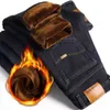 Jeans da uomo elastici autunnali e invernali pantaloni casual larghi a tubo dritto autunno grandi con ispessimento felpato 211111