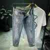 Jeans da uomo Nine-Point Men 2021 Summer Section Sezione sottile strappata Foro Tide Marca Slim Piedi Stile coreano Pantaloni alla moda