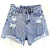 Kvinnor lyxiga tofs fringed hål jeans shorts kvinnlig hög midja sommar mode designer brett ben denim 210724