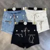 DEAT Frauen Persönlichkeit Streetwear Asymmetricaal Denim Shorts Hohe Taille Mode Temperament Frühling Sommer 11D1764 210709