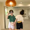 Korean style children fashion unisex solid color short sleeve shirts Boys girls loose single breasted Tops 210615