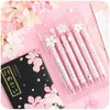 Stylos à gel 6pcs / pack 0.5mm Kawaii Fleurs de cerisier Étoile Stylo à encre noire Stylo à bille Filles Enfants Cadeau École Bureau Papeterie