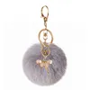 2022 Key Chain Party Favorit Gullig Rhinestone Ballerina Girl Rex Rabbit Fur Ball Kvinnlig väska Hängsmycke