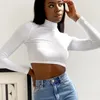 Schwarze sexy Frauen rückenfreie Bandage aushöhlen Crop Tops Herbst O-Ausschnitt Langarm abgeschnitten Casual Lady Bodycon T-Shirt Blanc Femme 210604