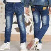 Boy Girl Jeans primavera y otoño nueva versión coreana 2021 moda guapo cremallera cintura elástica Casual pantalones ajustados para niños 210317