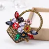 Brocas de cesto de flores com colorido brilhante strass mulheres meninas broche pinos de moda jóias casamento decoração