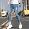 Potlood jeans negen punten gescheurde ontwerpen blauwe kleur slank strak passende kleine elastische gewassen zachte stof kwaliteit broek heet verkoop. X0621