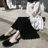 Gotisk lång svart stickad kjol Kvinnor Vinterkakad stickad oregelbunden kjol Autumn Korean Style Female Tassel High midje kjol 210619