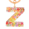 Porte-clés femmes Alphabet anglais porte-clés résine époxy pendentif feuille d'or acrylique porte-clés femme sac voiture anneau bijoux accessoires Miri22