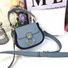 Wholesale free shopping luxury designer handbags with metal ring decoration fashion shoulder bags lady wallet phone bag