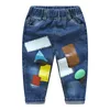 Casual vår höst 2 10 år 90 140cm Snyggt barn färg patchwork Pocket Elastic Cartoon Loose Denim Jeans för pojke 210701