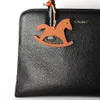 Berömd designer lyxig äkta siden äkta läder Seahorse Deer Keychain ryggsäck Pendant Animal Key Chain Women Bag Charm H0915256I