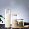 Contenitori per alimenti in vetro trasparente Tappi di sughero Copri barattoli Bottiglie per sabbia Liquido ecologico con coperchio in bambù Multi dimensionisa466322974