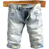 Estate Streetwear Moda Uomo Jeans Retro Azzurro Elastico Stampato Designer Pantaloncini di Jeans Strappati Stile Coreano Corto C9SW