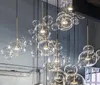 現代のボーレランプLEDペンダントライトガラスグローブぶら下げランプの据え付け屋内照明光沢のあるルミニアの吊り下げ