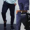 Nuovi pantaloni sportivi da uomo fitness da jogging sport per il tempo libero esercizio Leggings pantaloni sportivi da uomo all'aperto X0705