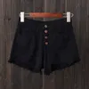Sexig heta denimshorts Hög midja ihålig Tassel Jean Shorts Vintage Overdimensionerad Harajuku Short Jeans Casual Button Fly Shorts 210306