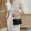 شعبية crossbody الكتف حقيبة المرأة 2021 جديد المد الأزياء لؤلؤة سلسلة حقيبة صافي الأحمر الصيف مطوي أكياس سحابة