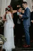 2021 Bohemian Plus Size Lace Bröllopsklänningar med långa ärmar av axelstranden Brudklänningar En linje golvlängd Boho Vestido de Novia