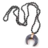 Collane con ciondolo Gioielli tribali bohémien di moda Pietre di ematite Collana etnica da donna con luna di pietra annodata