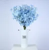 Simulering konstgjorda dekorativa blommor växtkryptering kors lila bröllopslayout båge dekoration blomma