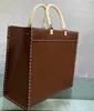 Borsa di alta qualità di lusso a mano 2801s moda donna lettere in pelle intrecciata shopping da viaggio tot Pendolare una spalla palmare 35x17x31 cm