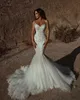 Gorgeous 2022 Lace Mermaid Wedding Dresses Strapless Neck Beaded Bridal Gowns Backless Sweep Train Sequined Appliqued Tulle Vestido De Novia