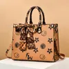 Whole ladies leather shoulder bags Hong Kong elegant large-capacity printing Tote bag street trend polka dot Joker handbag ret227u