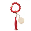 Porte-clés en perles de bois pour femmes, commerce extérieur, motif de noël, mode, personnalité, disque, pompon, bracelet, vente en gros